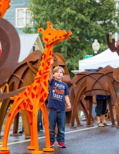 arts festival - boy with girafe - photos by LStern Media